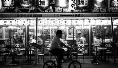 Commuter and Kushikatsu Restaurant. Osaka, Japan. 2023.