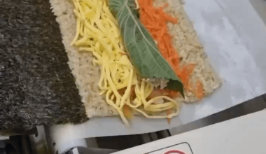 Automated sushi rolling