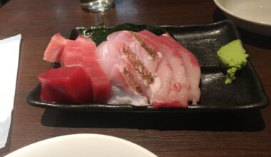 Sashimi, squid, pork, snapper head and sake