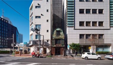 100 years old copper-plated facade enfolds renovated Izutsuya Gallery in Tokyo