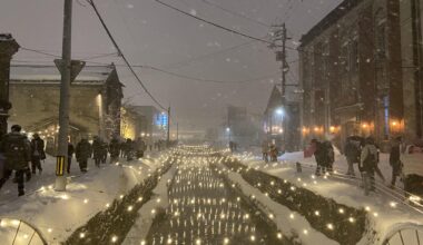 Otaru lit up for the Snow Light Path Festival with snow coming down