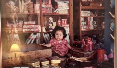 Friend took this photo in Okinawa 1953: Girl in her mother’s shop.