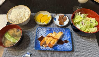 Last night's dinner... Air fried pork katsu, miso soup with mushrooms and snow peas, rice, salad, pickles.