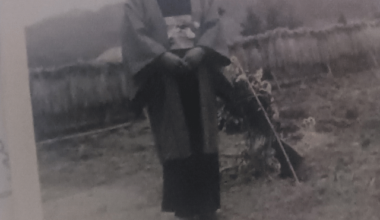 A Japanese woman in unknown field with strange plants WW2 era