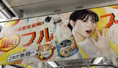 Am I going crazy or did I just see the Great Muta on a fizzy drink advert on a Tokyo Metro.
