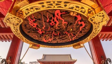 Favorite part of Senso-Ji: the carved wooden dragon on the underside of the big red lantern.