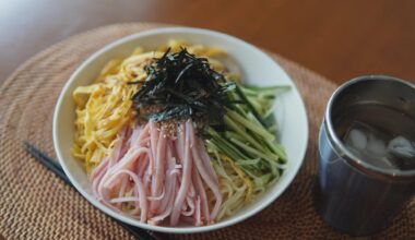 Japanese cold noodles with shredded omelet, shredded cucumber, shredded ham, and a sweet soy sauce shredded nori