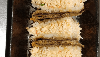 What is this? I had it yesterday at a sushi place and the menu says its a "club sushi" but I can't find it online. I found similar recipes called "Onigirazu" but it's not the same.