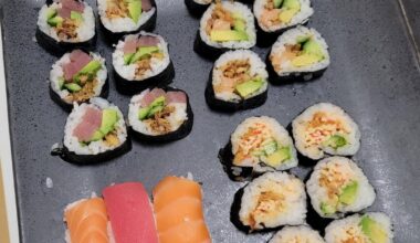 Made some sushi with salmon, tuna, spicy crab, cucumber, avocado, and crispy onions.