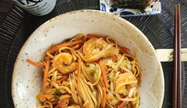 Yakisoba 🍜 and shrimp 🍤with grilled onigiri 🍙