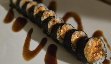 Homemade Spicy tuna rolls. Japanese bbq drizzle.