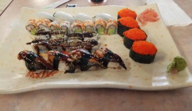 4 fish flying fish eggs, 4 squid, 4 Eel, California Roll, and Eel roll