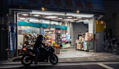 Biker arriving at a pharmacy - Tokyo