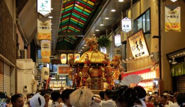 Mikoshi (portable shrine) passing through Nishiki Market in Kyoto during the Gion Festival