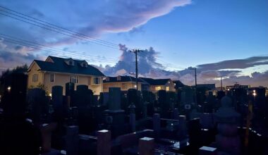 Temple graveyard in the suburbs of Yokohama at dusk.