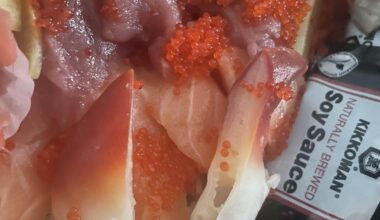 Help me identify this piece of sashimi on the bottom?