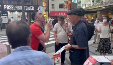 Tourists harassing Japanese protesters in Shinjuku.