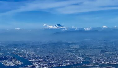 Mt. Fuji towers above Tokyo as seen on takeoff from Haneda Airport.