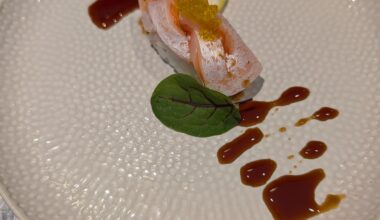 Braided salmon belly with nikiri sauce and yuzu tobiko