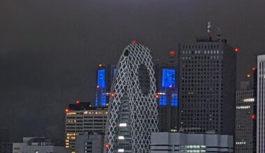 Shinjuku city lights reflecting off the clouds